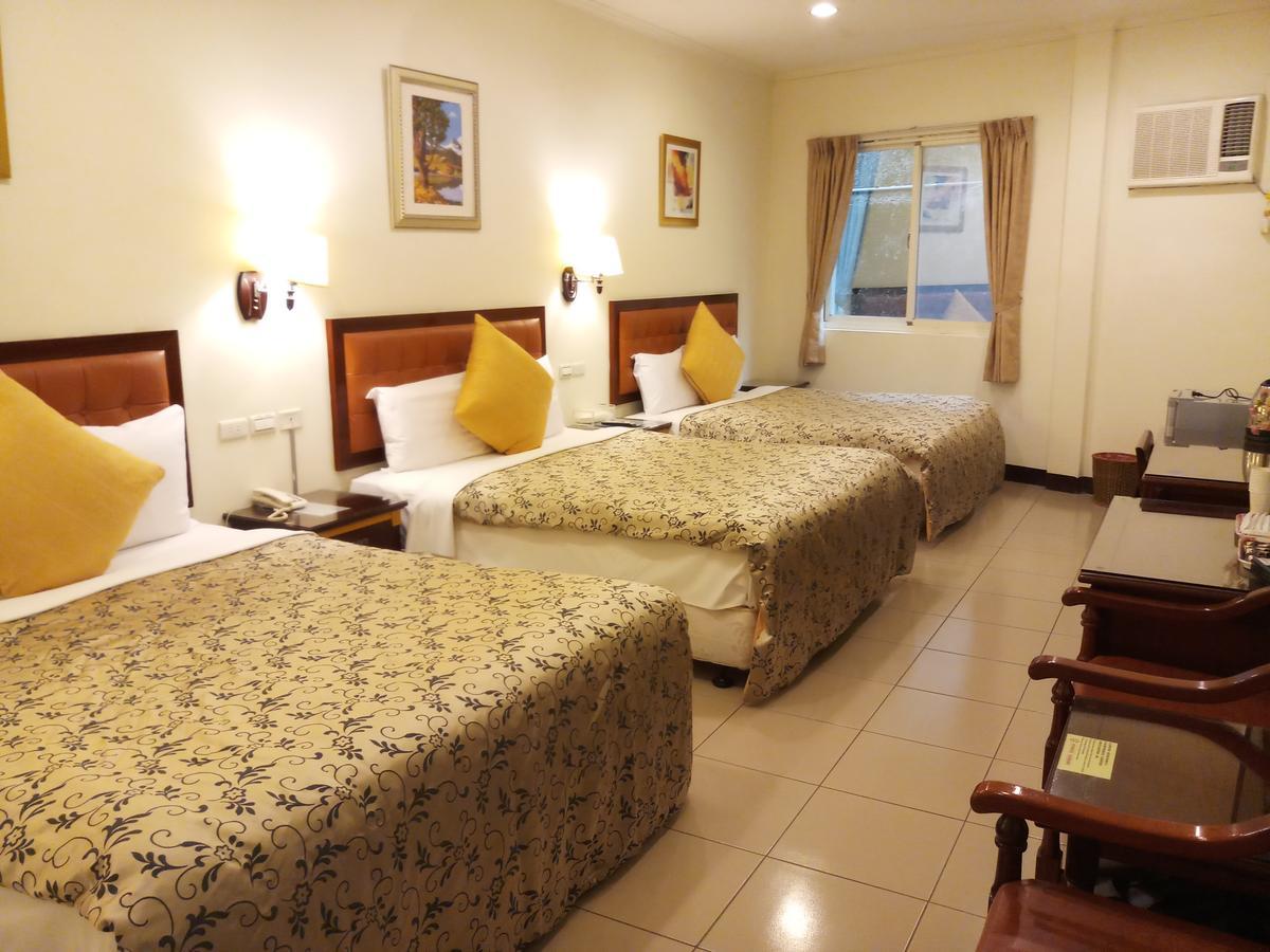 Puti Commercial Hotel Лонгтан Экстерьер фото